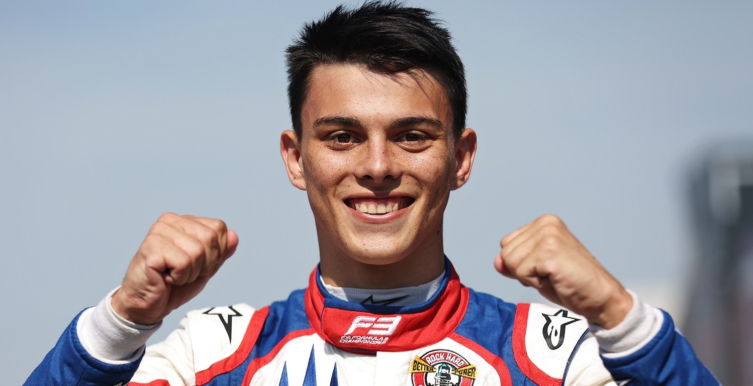 Trident's Zane Maloney holds up his fists in celebration after getting out of the car to finish F3 Qualifying.
