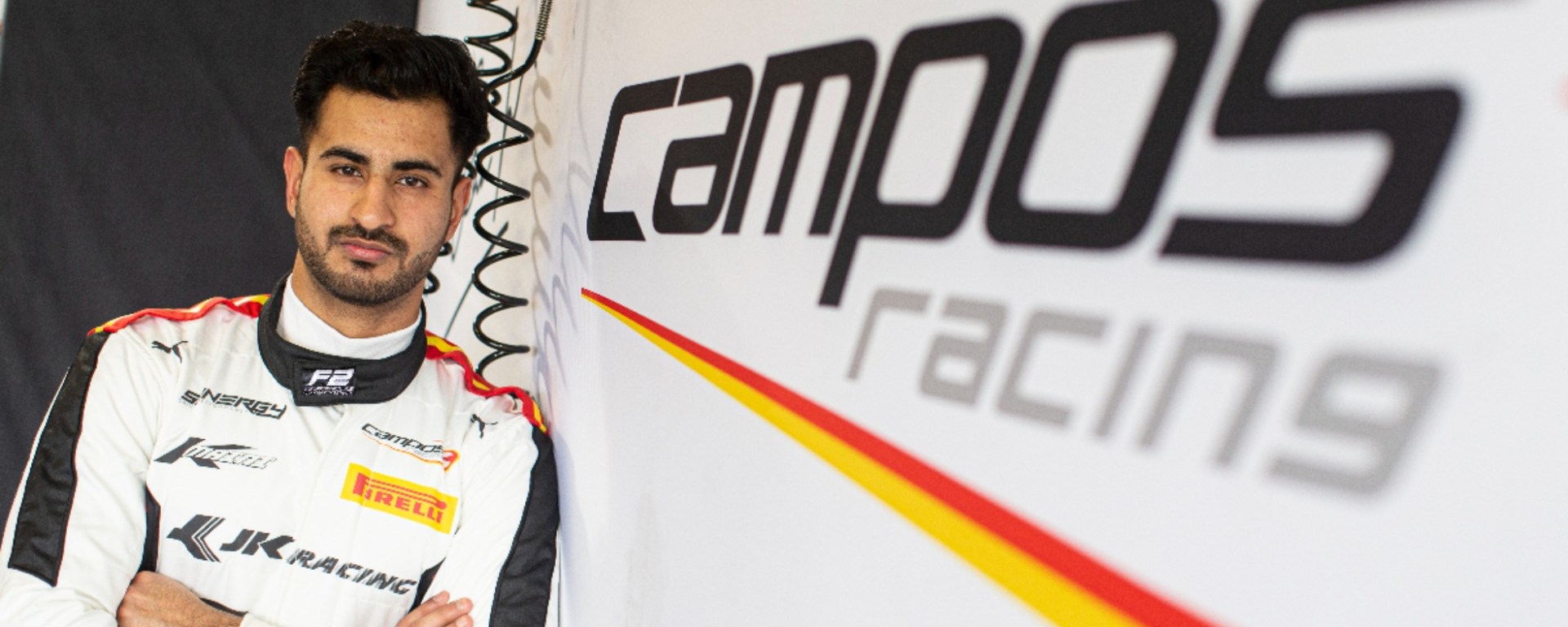 Kush Maini against a Campos Racing background