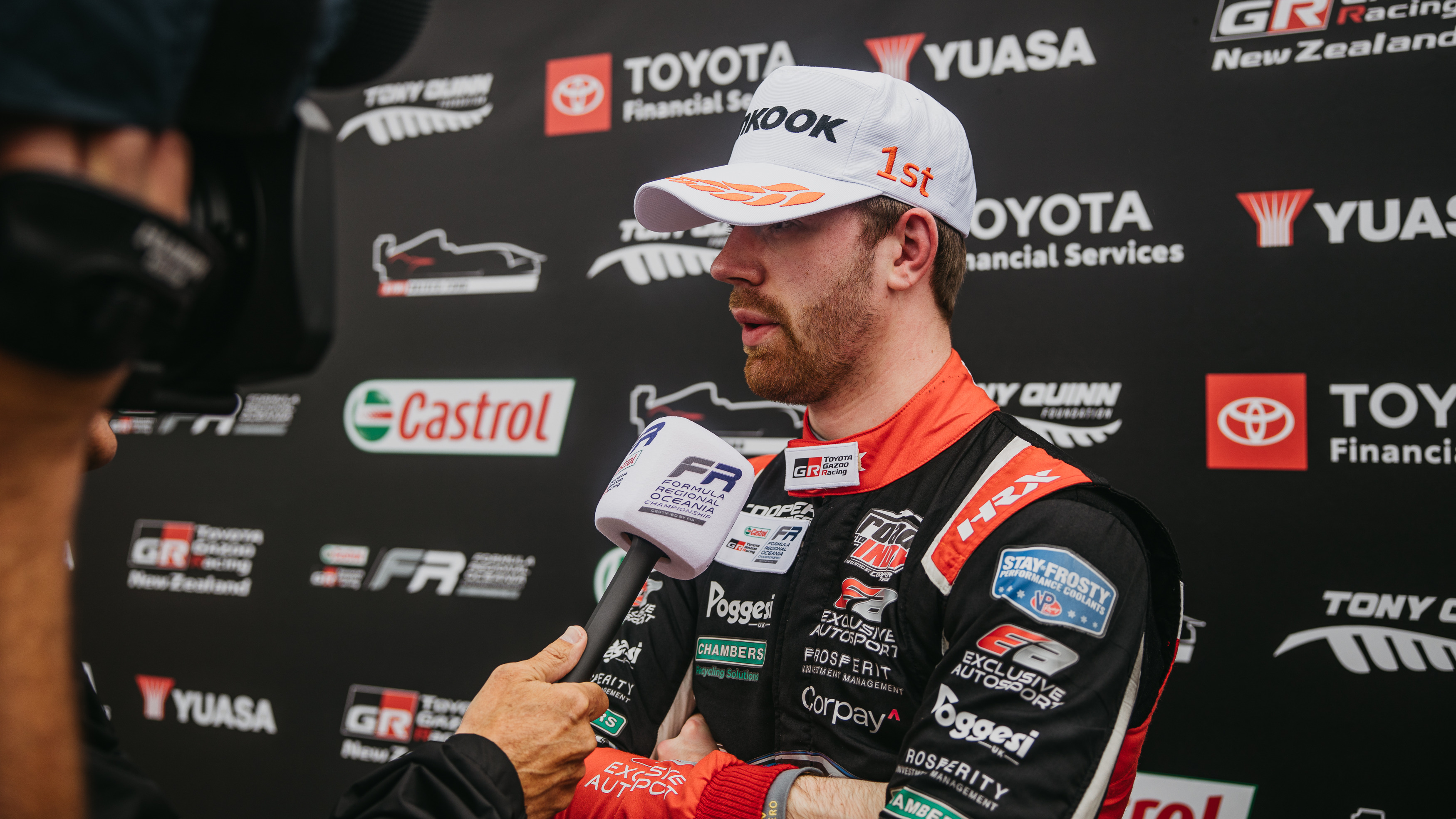 Louis Foster speaking into a microphone after Race 1 of Round 3 of FROC