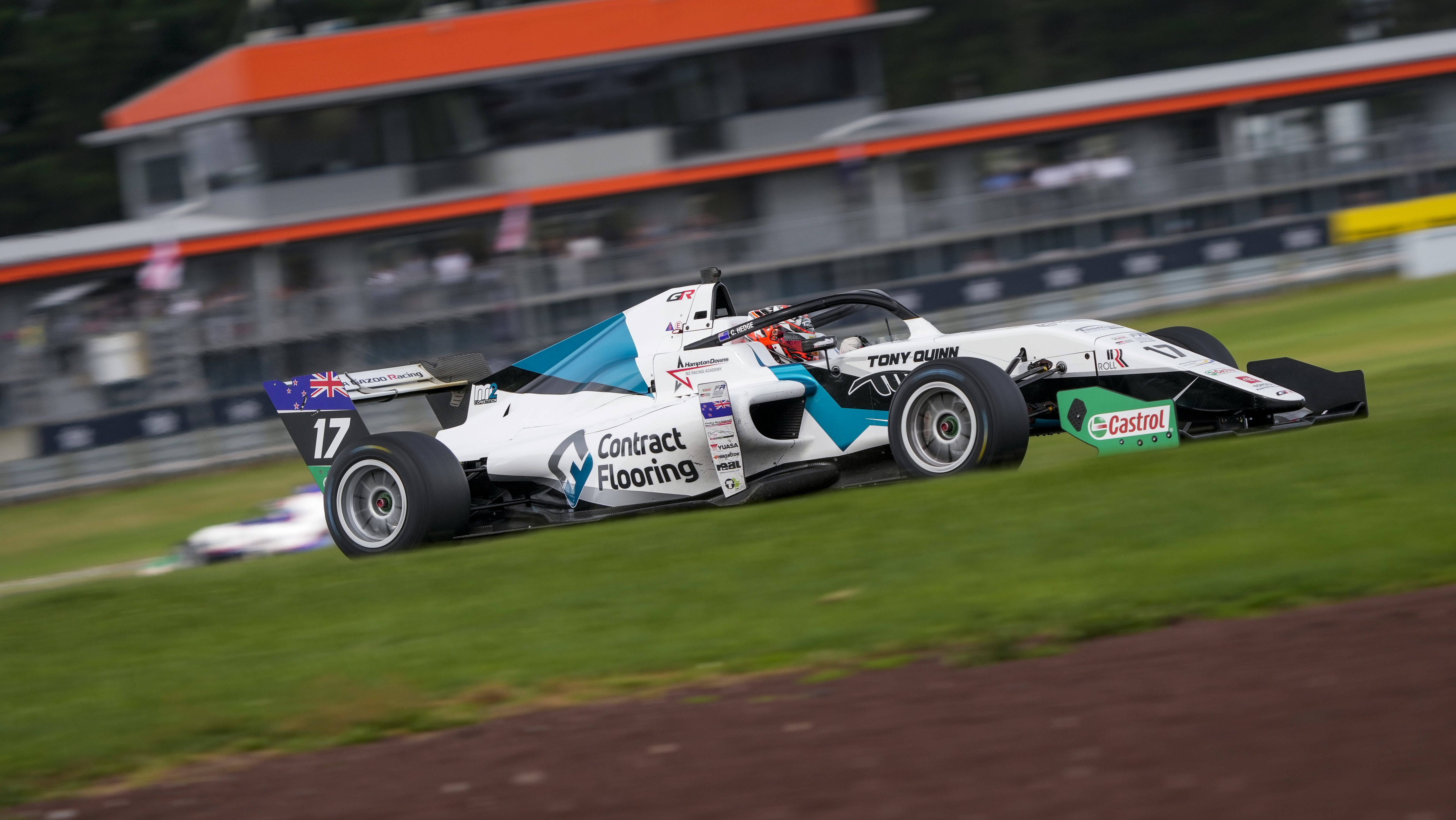 Callum Hedge's white, black and blue FROC car on track in Taupo