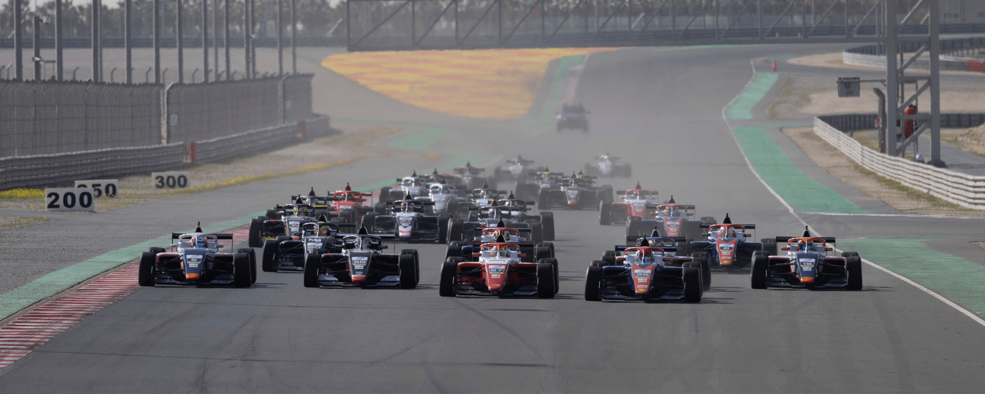 Cars on track at Kuwait coming towards the camera