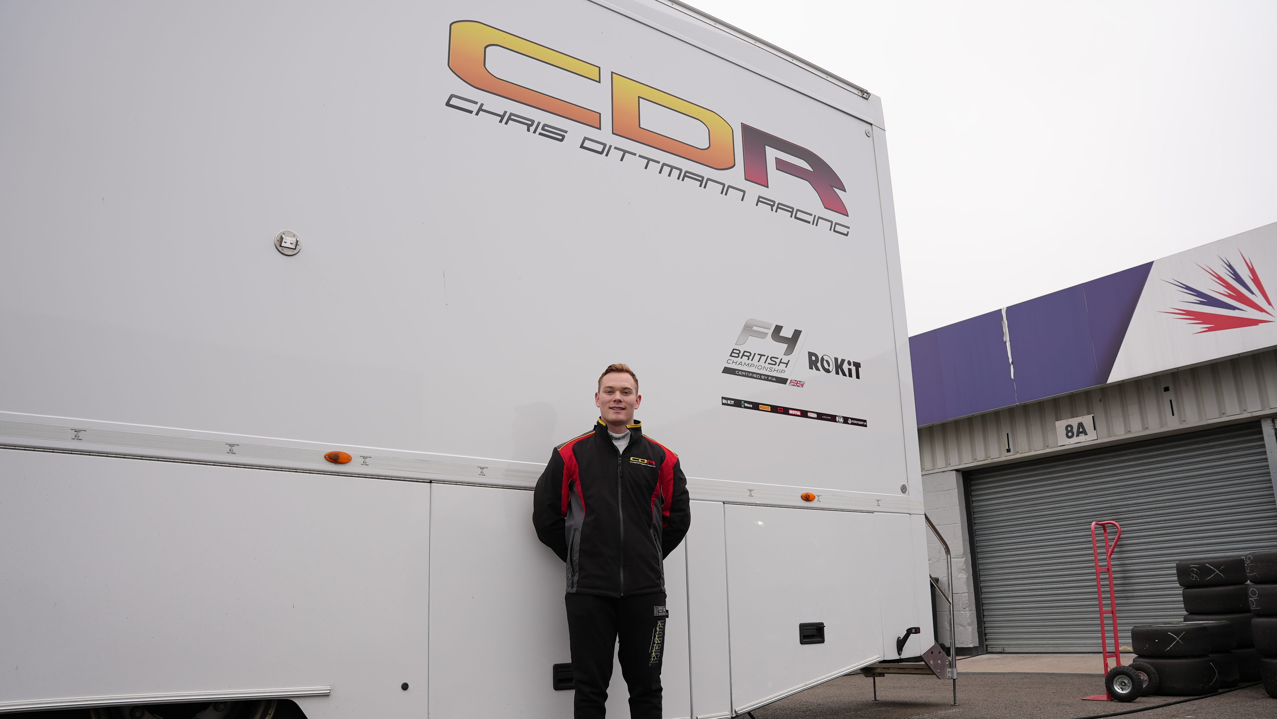Daniel Guinchard stood in front of CDR racing sign