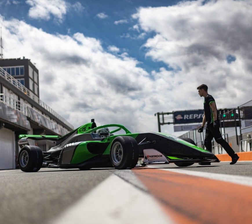 A green, grey and black Eurocup-3 car