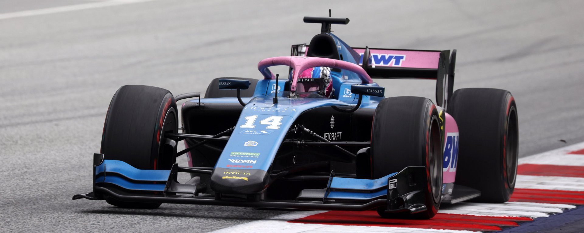 A blue and pink F2 car