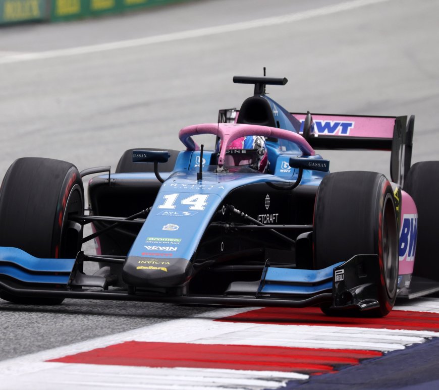 A blue and pink F2 car
