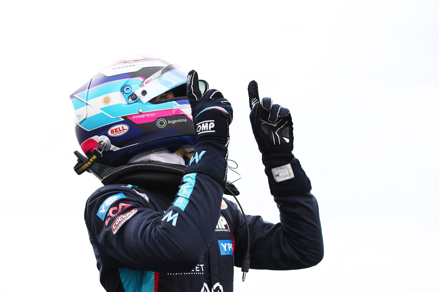 Franco Colapinto points at the sky