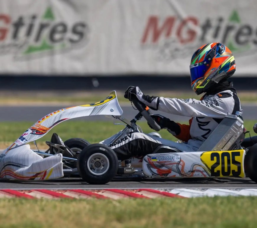 Oleksandr Bondarev racing a white kart