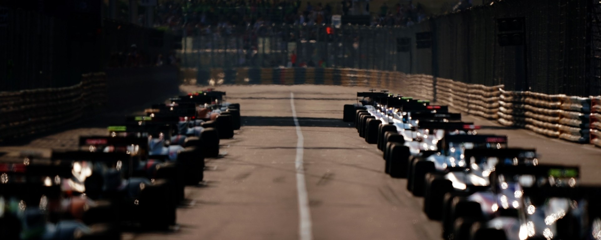 Cars await the lights on the grid
