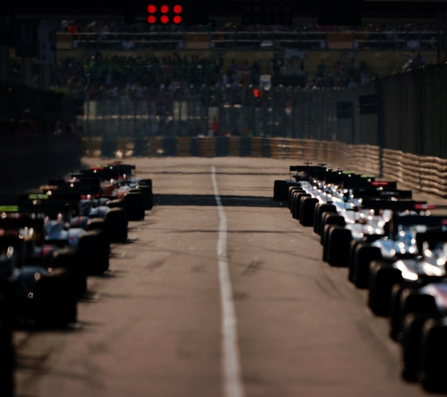 Cars await the lights on the grid