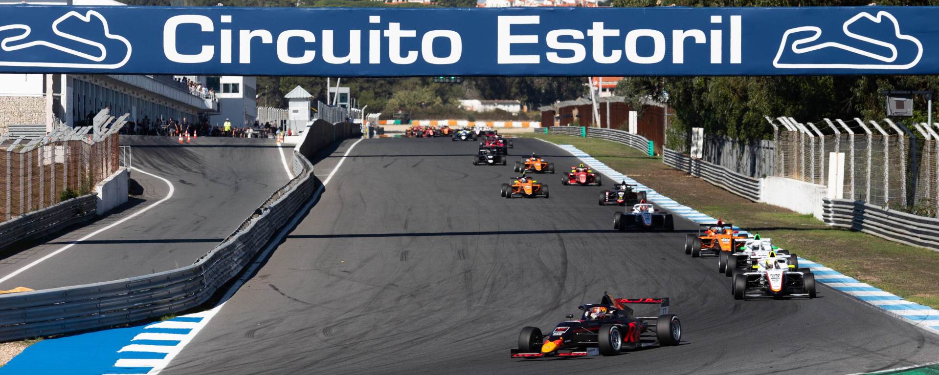 Cars on the start-finish straight at Estoril