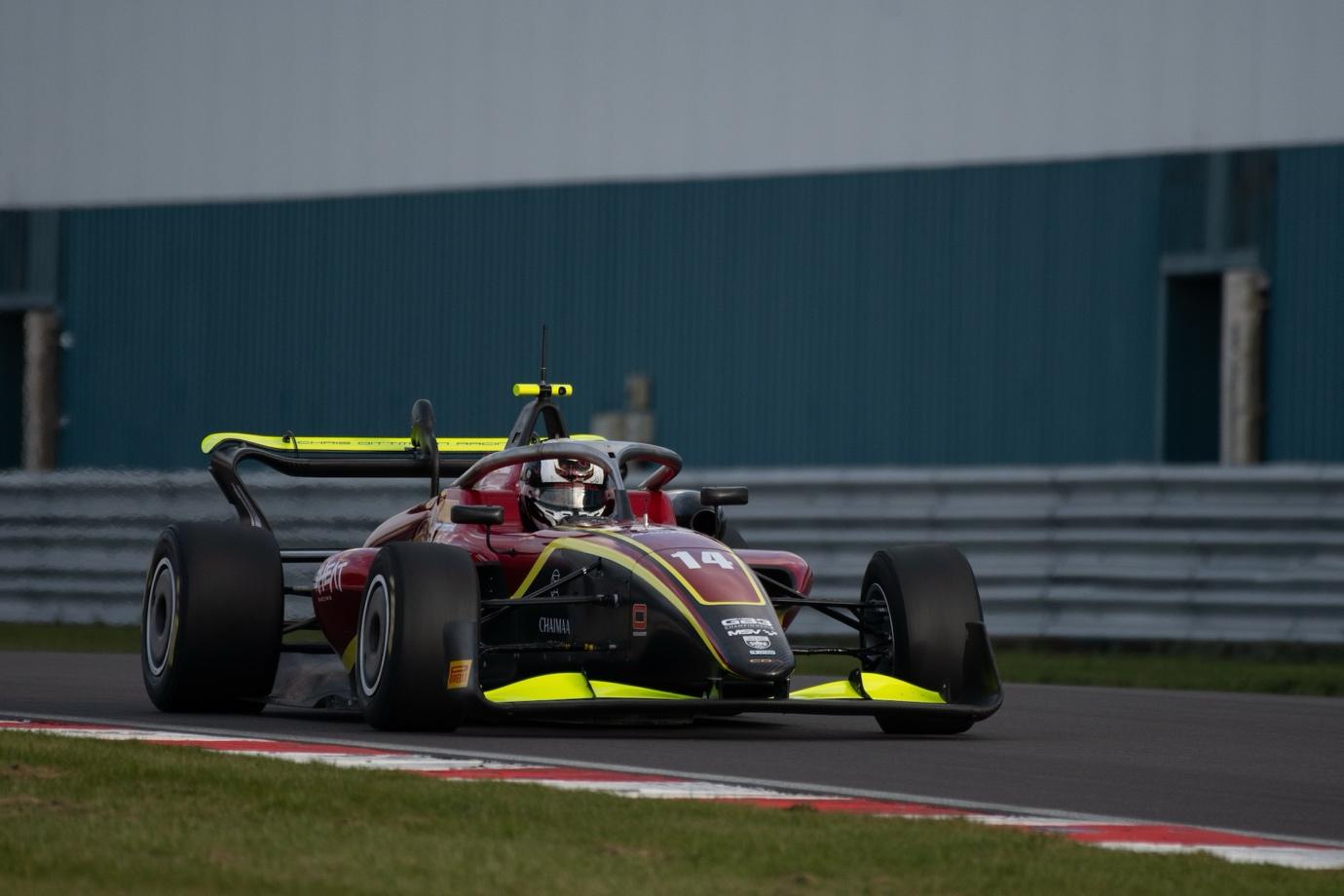 A race car on a track

AI-generated content may be incorrect.