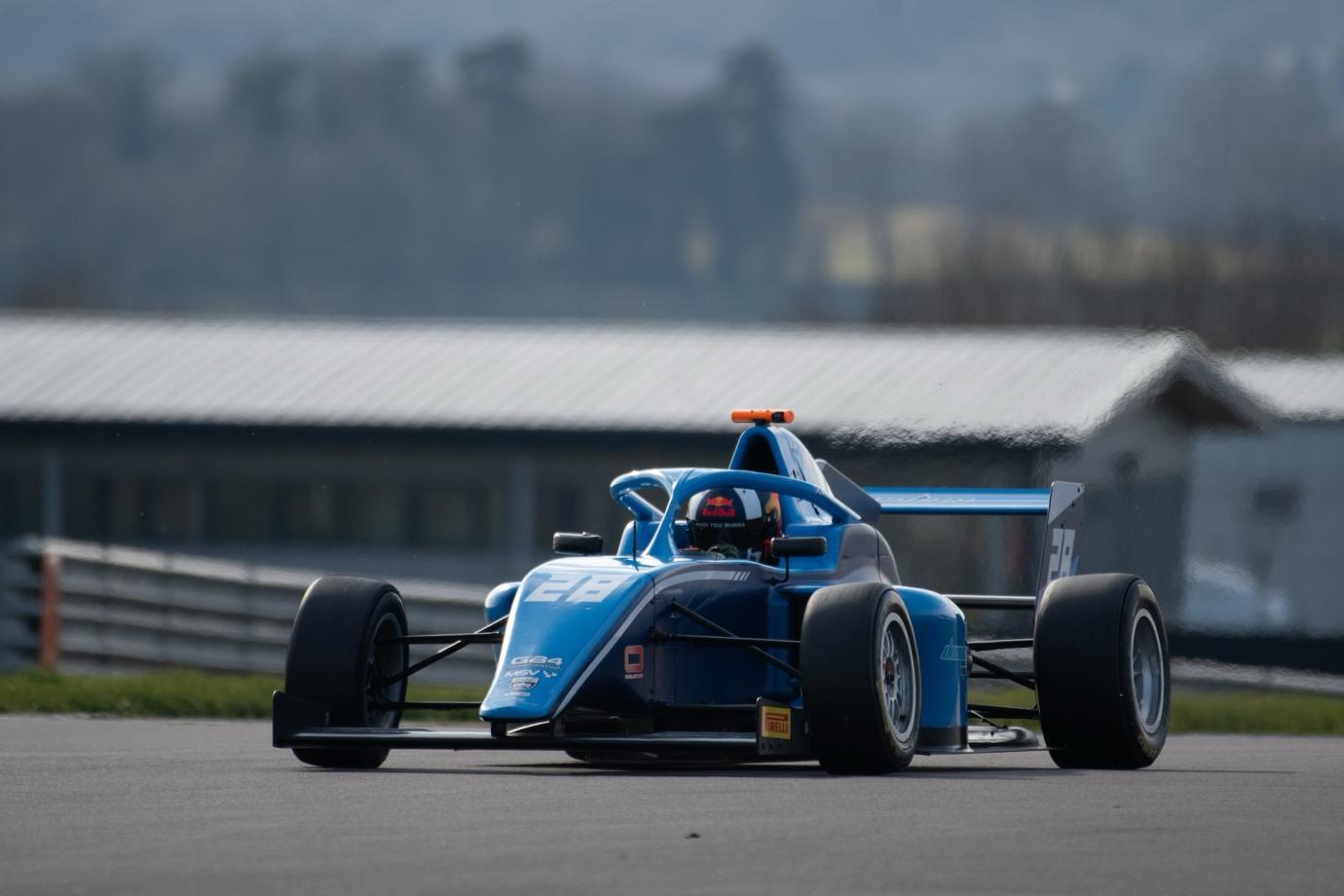 A blue race car on a track

AI-generated content may be incorrect.