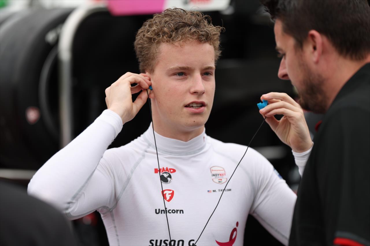 A person wearing a white shirt